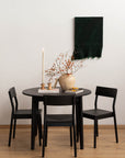 Round Black Wooden Dining Table - Pedersen + Lennard