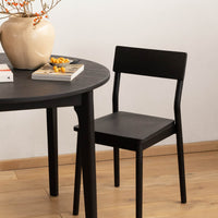 Round Black Wooden Dining Table - Pedersen + Lennard