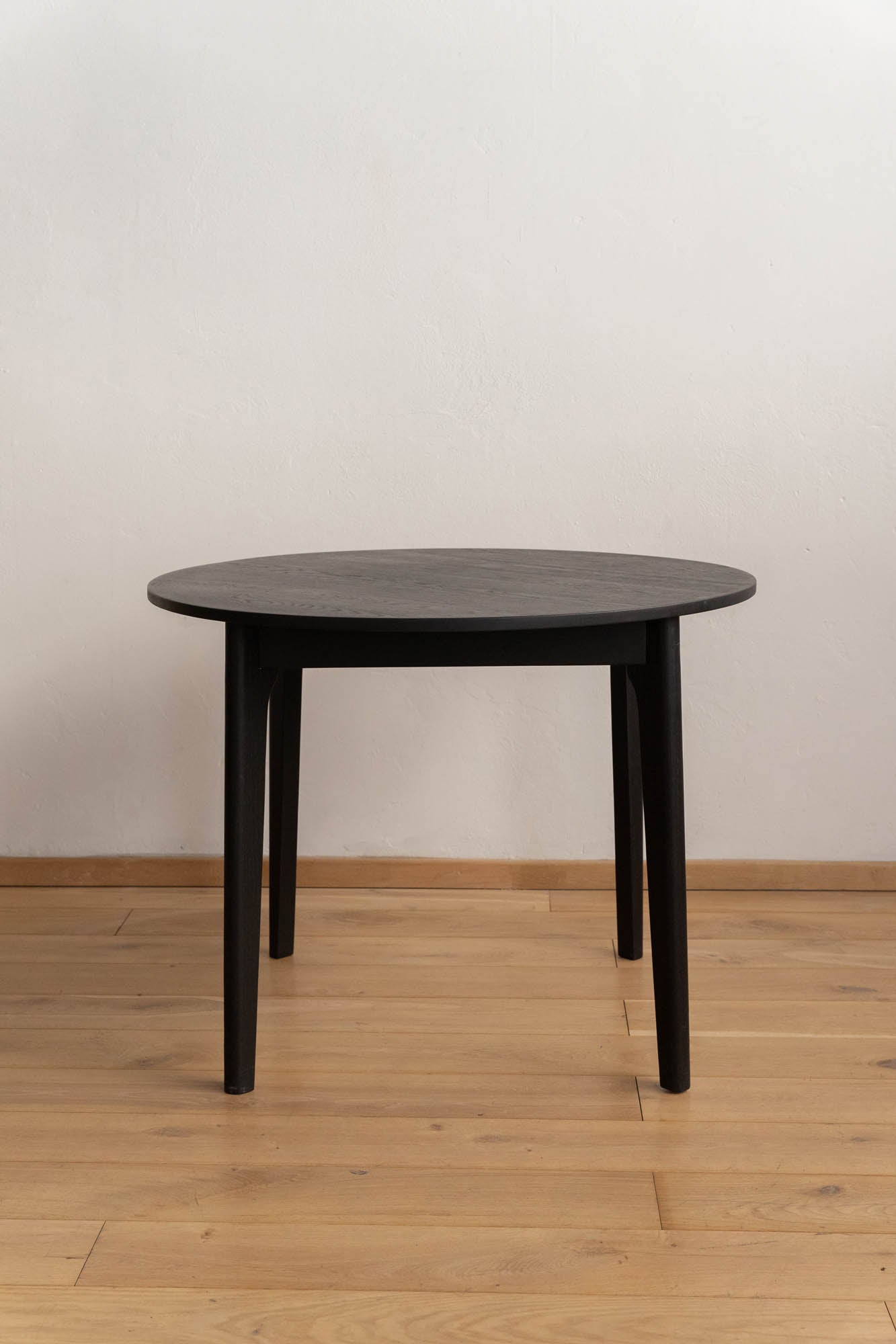 Escarpment Round Wooden Dining Table - Pedersen + Lennard