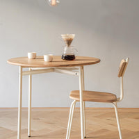 Round wooden cafe table and chair - Pedersen + Lennard